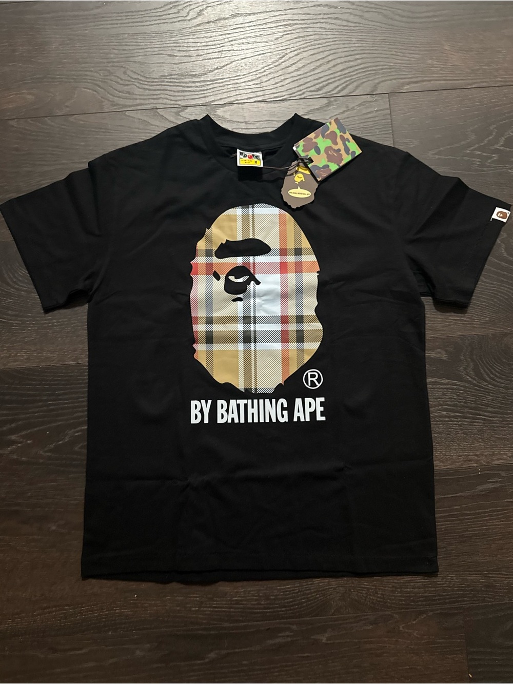 A Bathing Ape Black Short-Sleeve Tee with Beige Plaid Ape Head